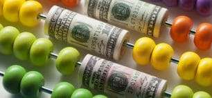 Money on an abacus